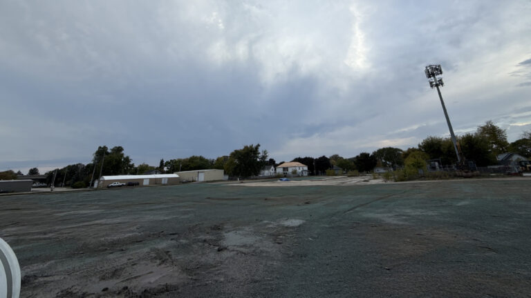 Large dirt field fully covered with hydroseed for lawn establishment in Wisconsin